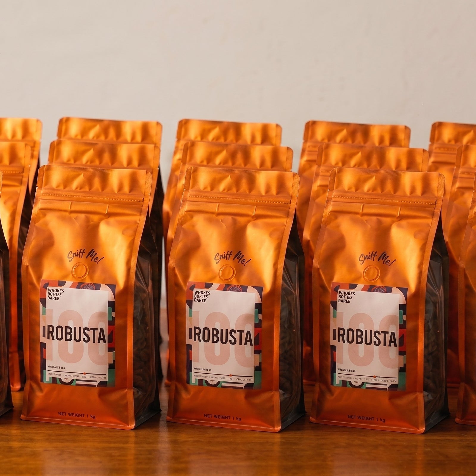 Sealed orange Agross Robusta bags lined up for Metro Cebu wholesale coffee supply